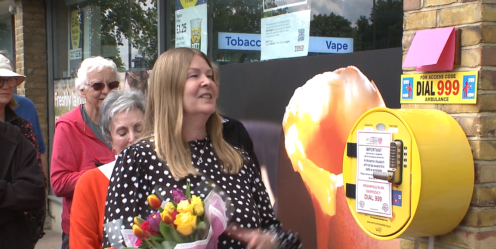 Stephanie unveiling the plaque in memory of Phil