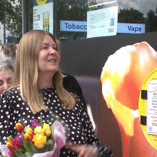 Stephanie unveiling the plaque in memory of Phil